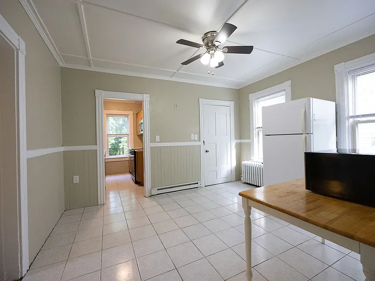Alternate kitchen view showing open layout and workspace