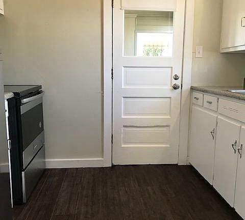 kitchen, looking towards screened in room