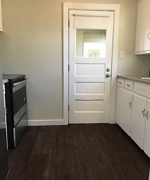 kitchen, looking towards screened in room