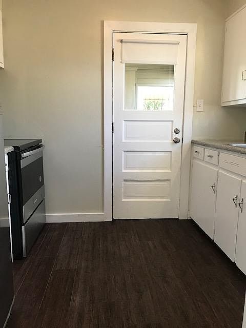 kitchen, looking towards screened in room