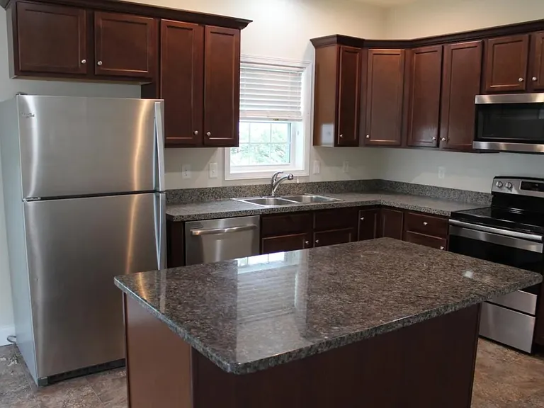 Open kitchen with granite top island