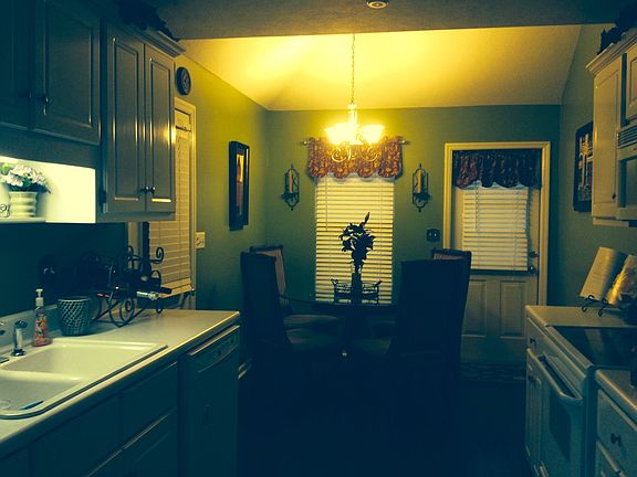 Our kitchen. It has a breakfast area with vaulted ceilings.