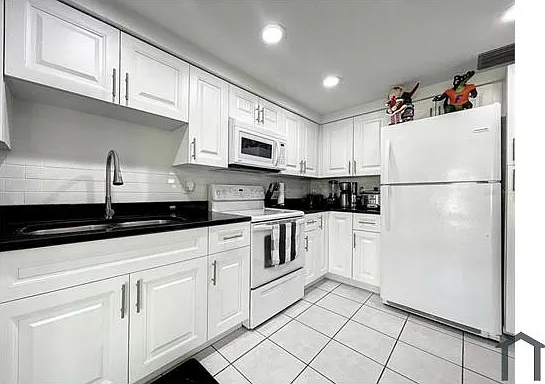8331 Wilkins St — Photo 1