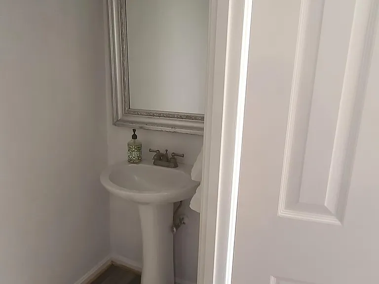 (1 of 4 Bathrooms) entryway powder room