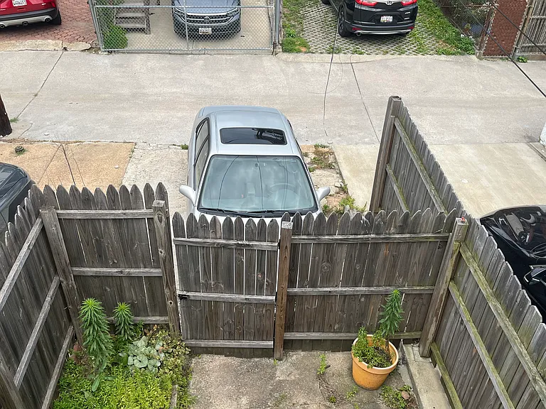 Parking Pad rear of Property 1 vehicle