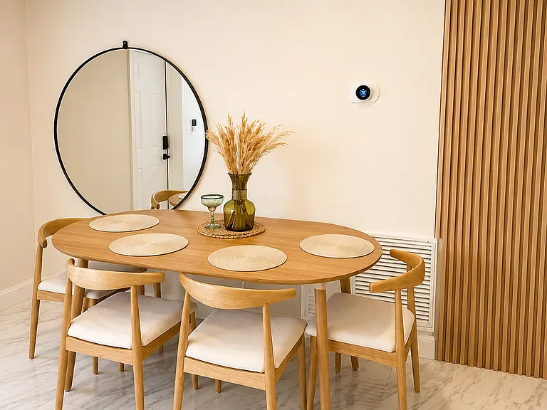 Comfortable dining space for group meals, family dinners, morning coffee, remote work, or gathering before heading out to the beach.