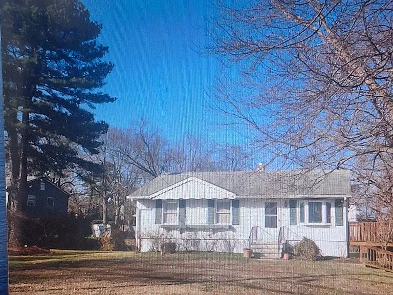 Exterior property. This is a very large property with a side deck and ramp.