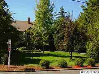 nearly 1/3 of an acre on this corner lot