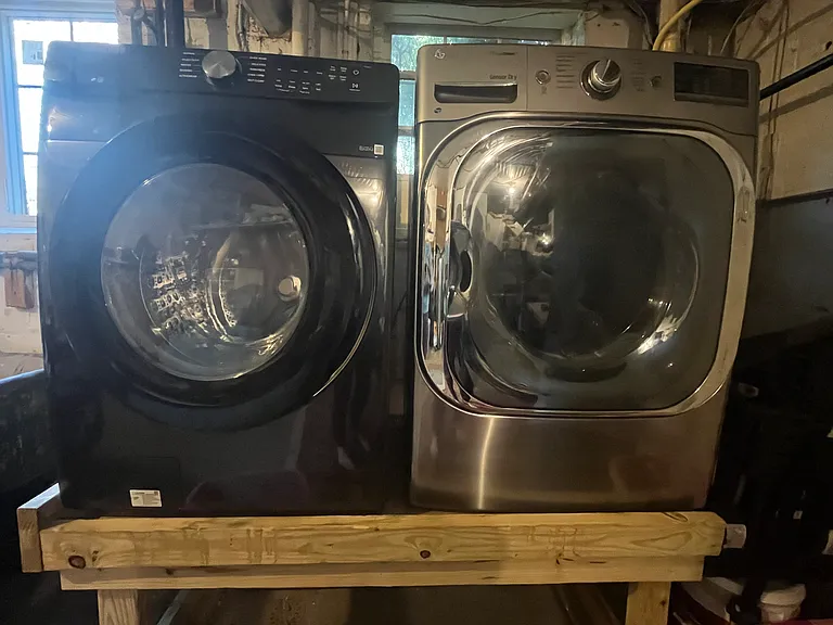 shared laundry - in the utility room, steps outside the apartment