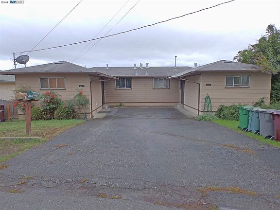the outside of the building. the unit is on the left