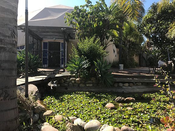 Koi pond and one front entrance 