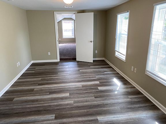 Living room with beautiful grey tones. 17' x 11'.