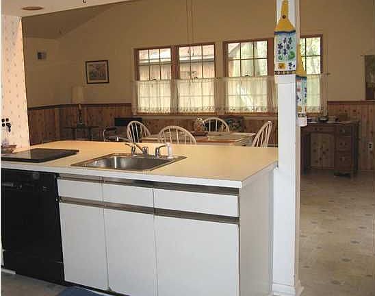 kitchen with newer dishwasher and disposal