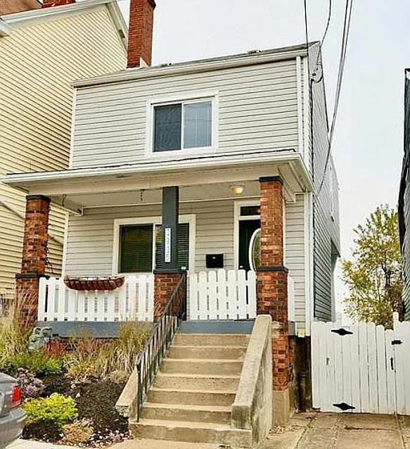 1908 Arlington Avenue - Covered gated porch, locked mailbox, new storm door, nicely landscaped