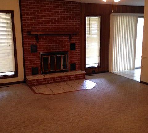 Den with fireplace