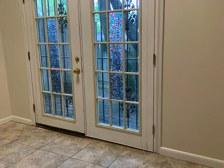 French Doors in Breakfast Nook Leading to Back Deck
