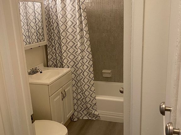 New flooring, new hardware, new vanity and lighting.