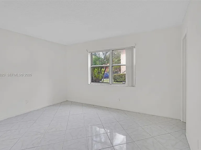 755 NW 104th Ave #104 — Photo 16