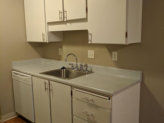 Updated kitchen featuring newly refinished counter tops, new