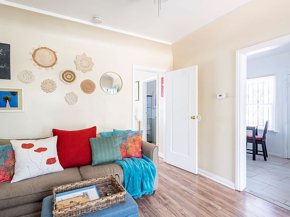 Cozy living room couch is a full-size Sofa Sleeper