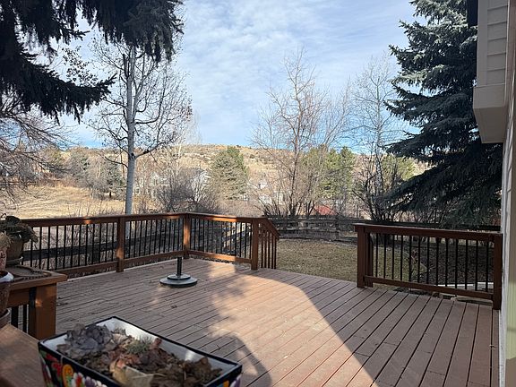 Deck and views of hogback currently (winter). Open space lot allows privacy, quiet and views.