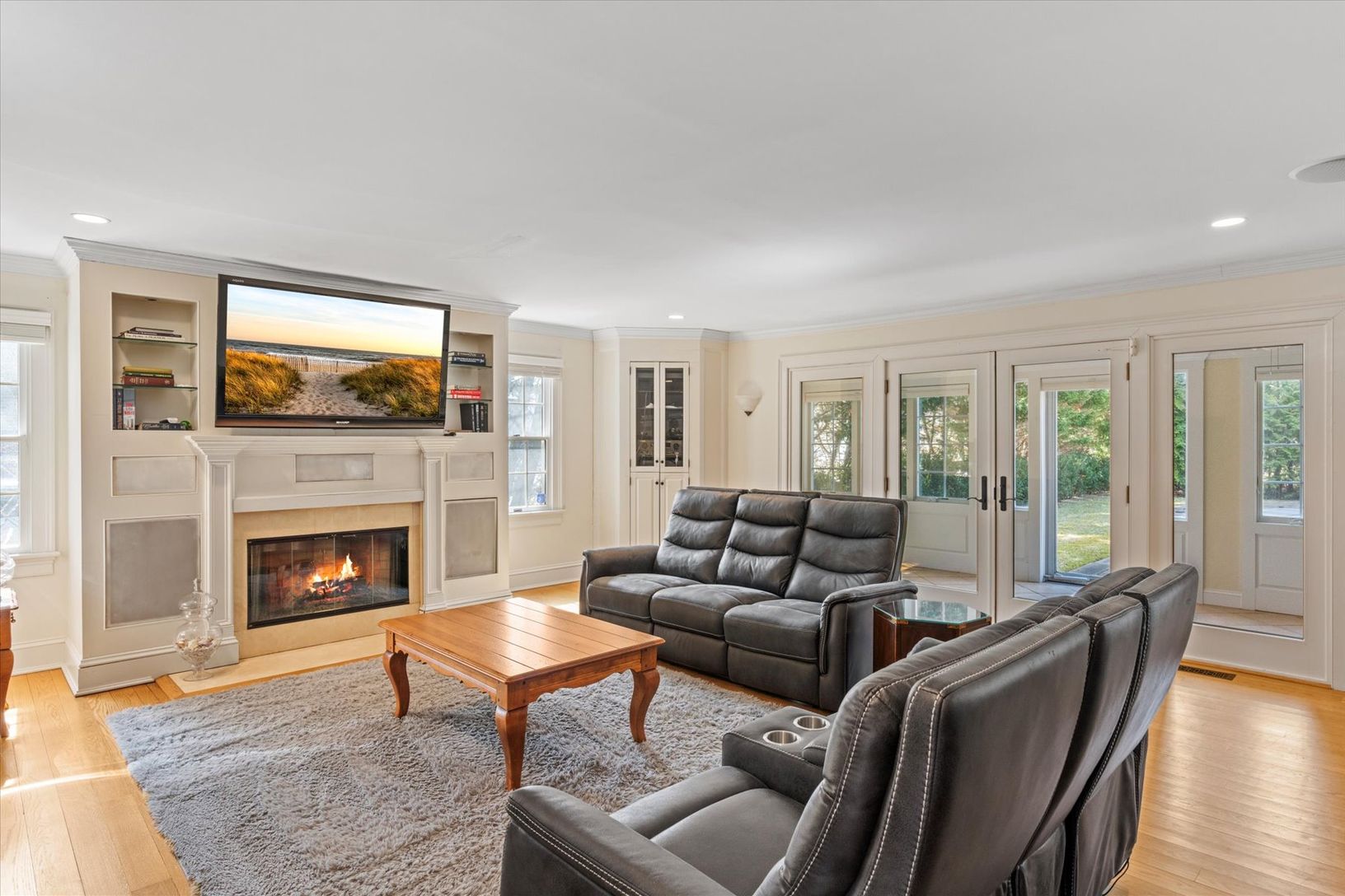  Spacious Living Room with Gas Fireplace, open to Sunroom