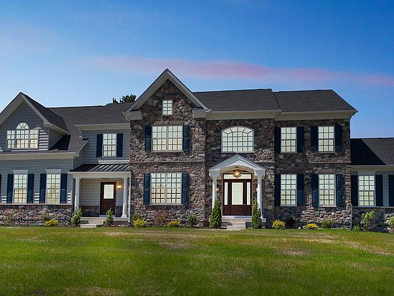 The Greenbrier Exterior Image Taken at Dusk New Home From Hallmark Homes