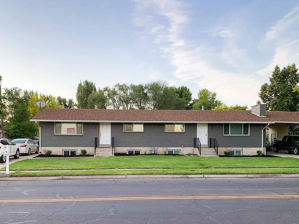 The unit in the left of this pic is available for rent. There is a long (uncovered) driveway that fits up to 3 cars.