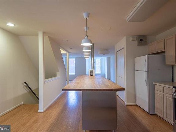 Kitchen looking to living room