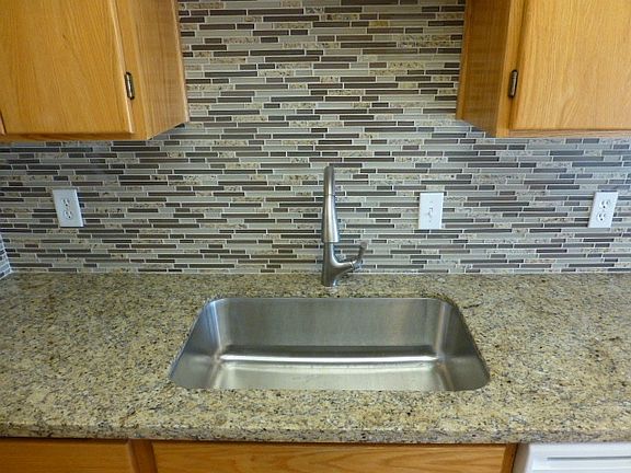 New Kitchen sink, faucet, granite counter & tile backsplash