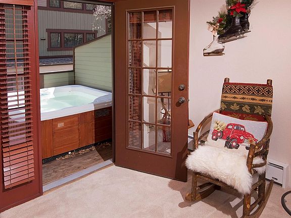 off the living room, access the deck with hot tub