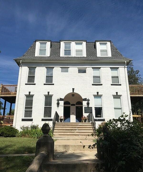 Front of building apt is on left side with deck