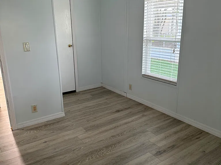 Guest Bedroom New Floors all the way thru the house