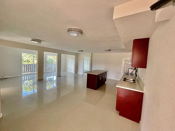 Living room, Dining area and Kitchen with outside deck