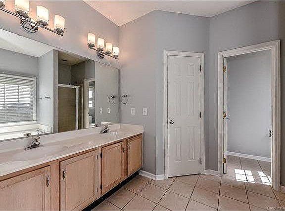 His and Hers Master Bath with separate shower, tub, toilet and huge walk in closet