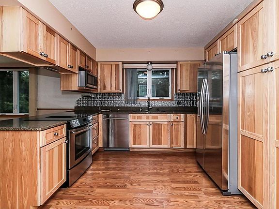 Freshly updated kitchen. Lots of counter and cabinet space. Window over the sink.