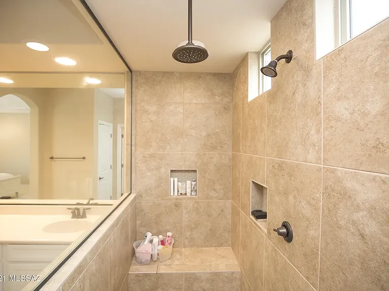 Beautiful walk in shower with 2 shower heads with windows for light