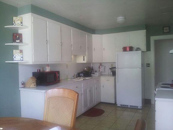 Stove and fridge included. Plenty of cabinets and counter space. New flooring being installed and all new paint!