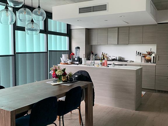 Open dining room and kitchen.