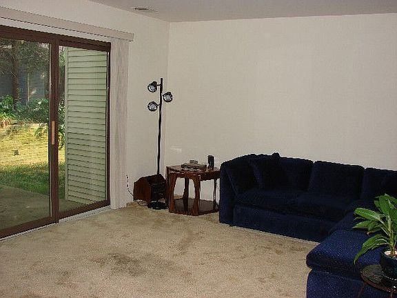 Huge family room with sliding doors to porch