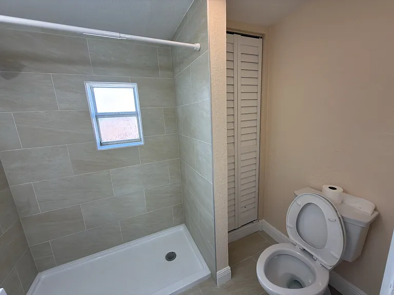 Bathroom with walk in shower- Linen closet