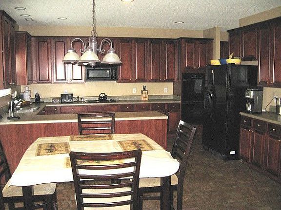 Spacious open kitchen with tons of huge cabinets