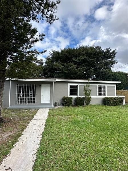 1st image of 810 NW 33rd Ave