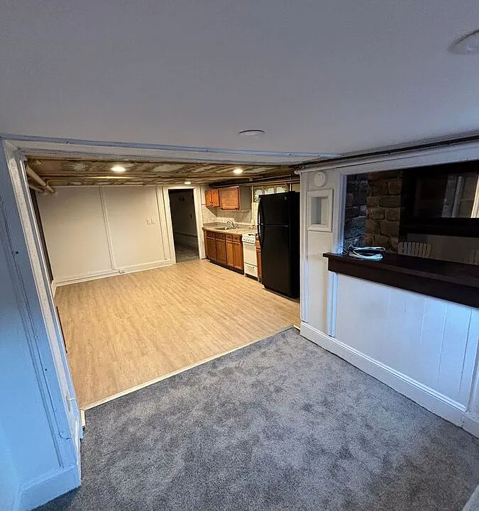 Entrance area, connecting to living room and open kitchen