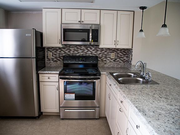 Kitchen - New cabinet, Microwave & Countertop