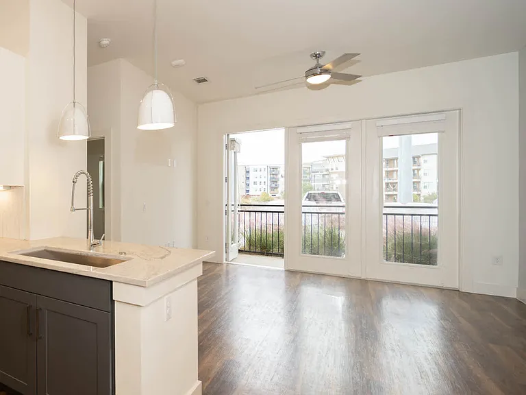 Living Room with Balcony and Hard Surface Flooring