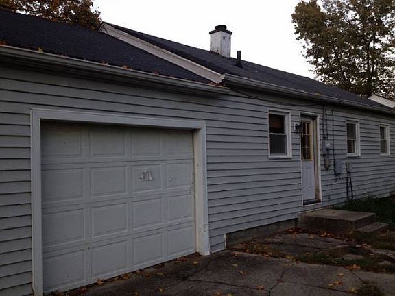 Attached garage, back hou
