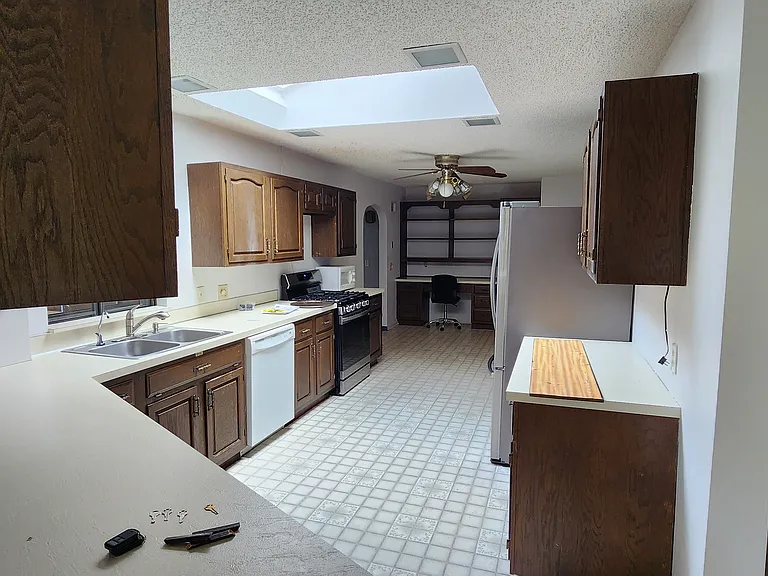 Kitchen. Lots of room to cook, bake or gather. Has Peninsula with room for stools.