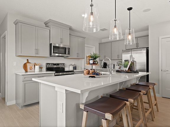 Spacious bright Kitchen of a DRB Homes Jupiter Model at Grasslands West in Lakeland, FL.