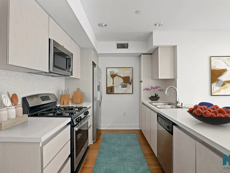 Kitchen with Energy-Efficient Appliances and Ample Cabinet Storage